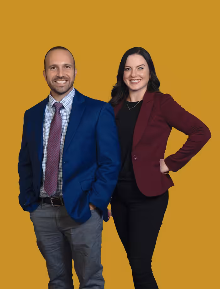 Attorney Kaelyn Diamond consulting with a client in a Clearwater office about debt defense options