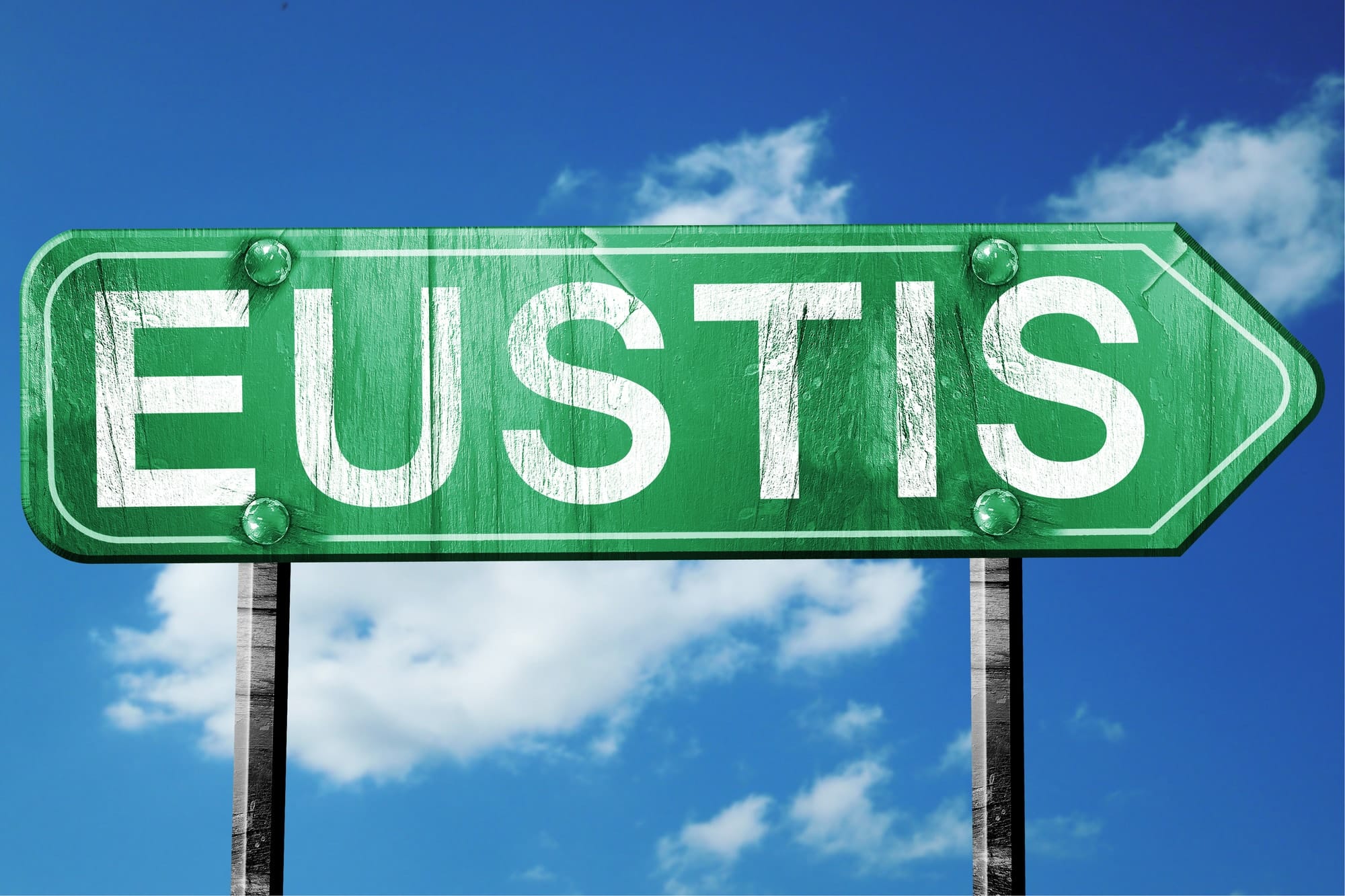 Finding the right Eustis bankruptcy attorney, depicted with a blurred image of a consultation.